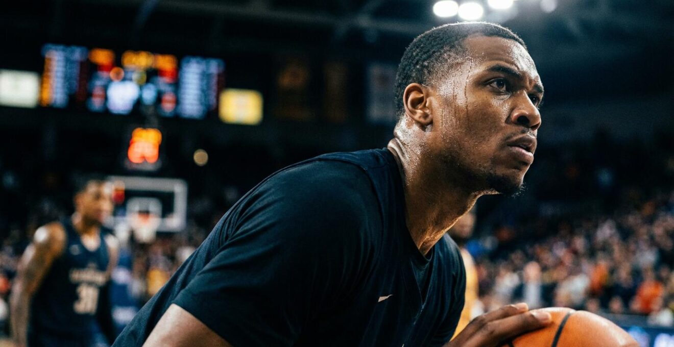 Professional athlete in mid-motion demonstrating intense focus during critical moment